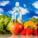 Vegetables, fruit and a bottle of water