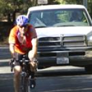Photo: Bicyclist and truck share lane on Old Davis Road.