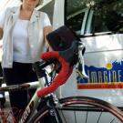 Nancy Redpath says her work on campus as an administrative assistant and off campus as the operator of the Davis-based bicycling tour company, Imagine Tours, complement each other.