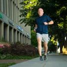 Photo: Scott Yates runs along Sacramento sidewalk.
