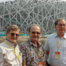 Food scientist Charles Shoemaker, right, was joined by former Aggies Richard Reidinger, left, and Robert Fontaine on a tour of the Olympic Games&rsquo; National Stadium in Beijing. Each was presented China&rsquo;s Friendship Award for contributing to Ch