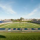 UC Davis Health Stadium, interior, showing field and emtty stands.