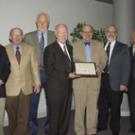 Larry Vanderhoef, center, accepts a certificate of appreciation from Academic Senate Chair Bob Powell, flanked by five former senate chairs on Feb. 24. From left: Lawrence Coleman (senate chair 1995-97), Dan Simmons (1991-93 and 2004-06), John V