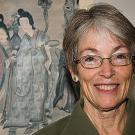 Photo: Susan Mann in front of a Chinese painting