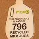 Photo: Sign in shape of plastic milk jug indicates a receptacle is made of 796 recycled milk jugs.