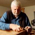 Neal Van Alfen works on a carpentry project in his Davis workshop/garage.  