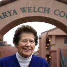 Photo: Marya Welch, photographed in 2005 at The Colleges at La Rue student housing complex, under the "Marya Welch Court" sign.