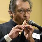 Antonio Flores plays a flute made from elderberry wood.